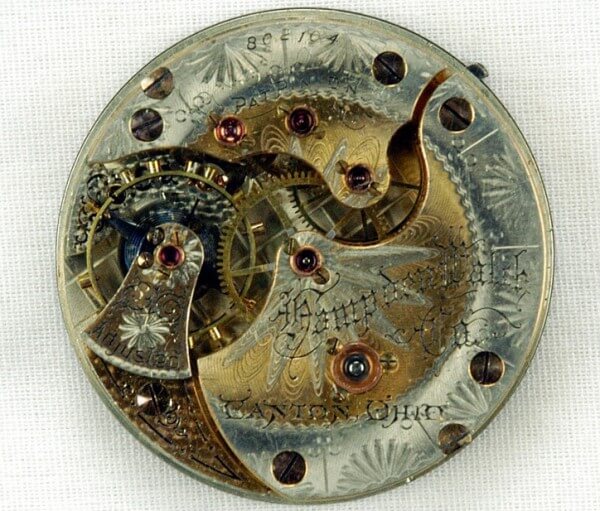 Hampden Watch Company 16 size, No. 103, 23 jewels, adjusted, ¾ plate, 2 color damaskeened nickel, free sprung, gold wheel train, gold jewel settings, lever set, hunting case, c. 1891 © DR