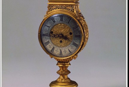 Horloge porte coiffe en cuivre plaquée or