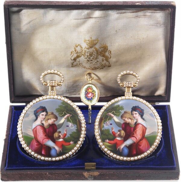 The Royal Presentation Mirror-Image Pair, i.e. a pair of gold and painted enamel pocket watches, set with pearls, dating from the beginning of the 19th century © Antiquorum