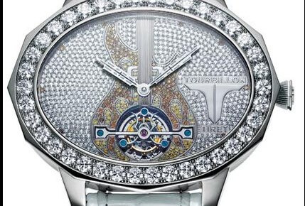 The Tiret New York Tourbillon Guitar has a tourbillon movement from Antoine Prezuiso. It is one of a kind and set with diamonds and gemstones in the pattern of a guitar.