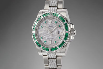 The Submariner Emerald, set with baguette emeralds on the bezel, round emeralds on the dial and round diamonds on the dial and bracelet links. It sold for CHF 275,000 at the Philips in Association with Bacs & Russo Auction 6