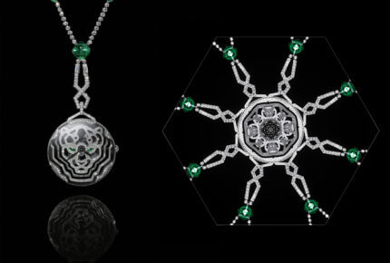 Cartier Panthère Hypnose Pendant Watch with baguette and round diamonds, three emeralds including a 6.65-carat sugarloaf cabochon emerald, and gem-set bridges that form the shape of a panther’s head. It contains the manual wound Caliber 9613 MC.