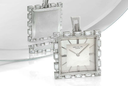 Patek Philippe platinum and diamond set manual winding pendant watch
