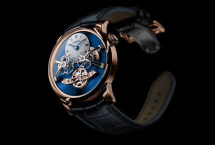 MB&F Red Gold Blue Legacy Machine No.2 - The signature dual flying balances and white lacquered hour and minute subdial are raised over a rich blue sunburst dial plate, encased in 18k red gold.