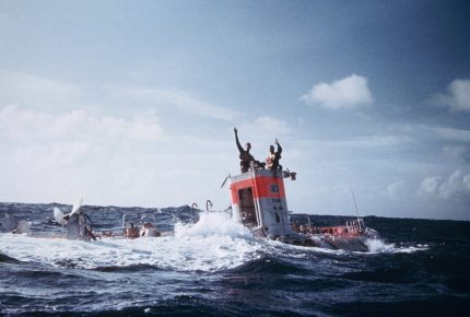 Jacques Piccard and Don Walsh waving from the Bathyscaphe Trieste - © Thomas J. Abercrombie/National Geographic Creative